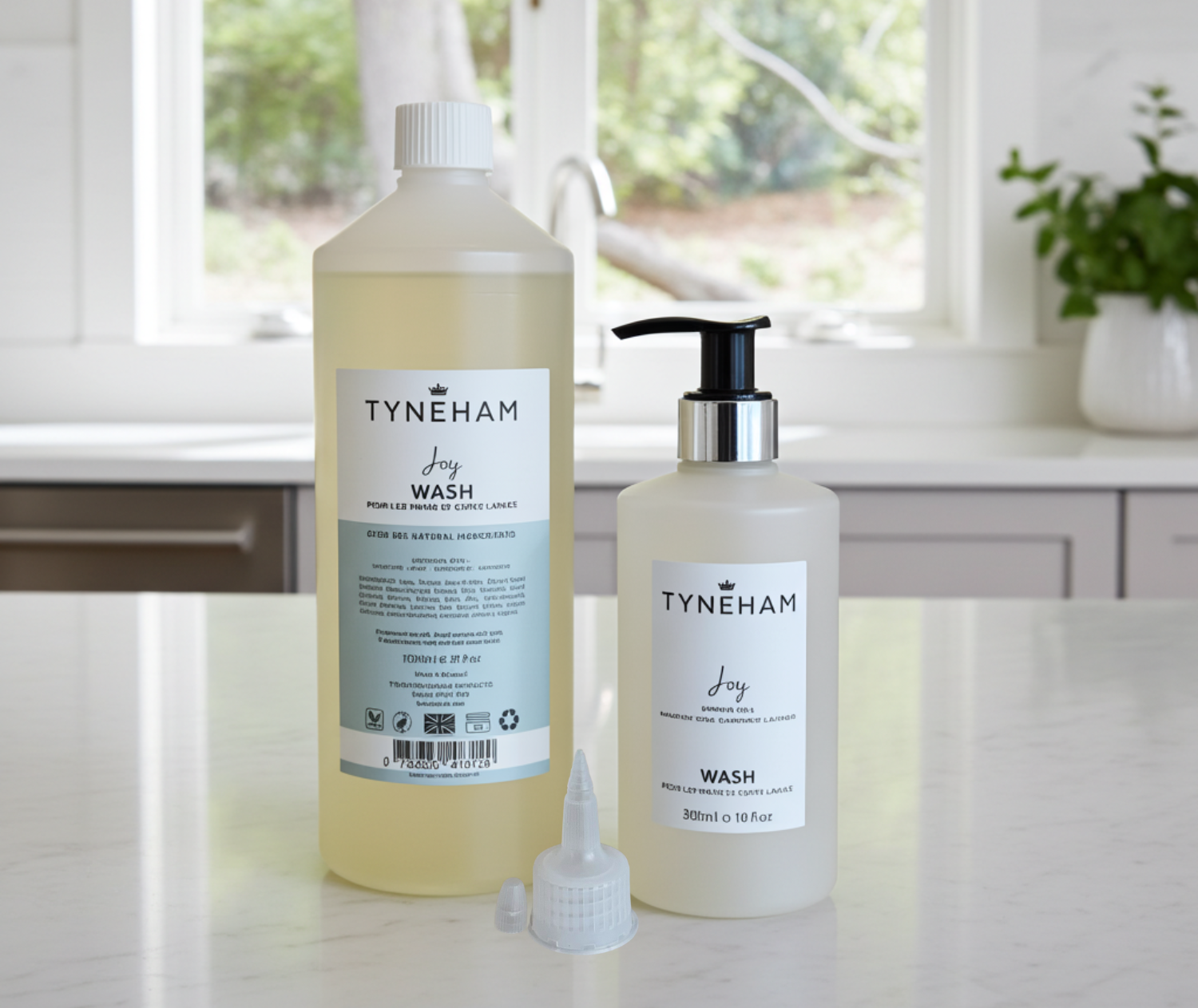 Two bottles of Tyneham 'Joy Wash' on a kitchen counter with a window in the background.